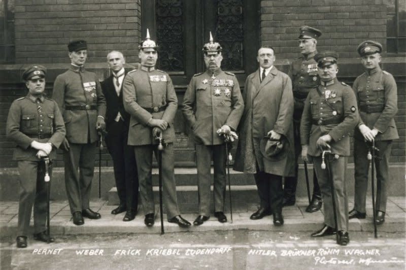 The defendants in the Beer Hall Putsch trial pose for a photo in Munich, Germany, on the last day of the trial, April 1, 1924. From left are Heinz Pernet, Friedrich Weber, Wilhelm Frick, Hermann Kriebel, Erich Ludendorff, Adolf Hitler, Wilhelm Brückner, Ernst Röhm and Robert Wagner.