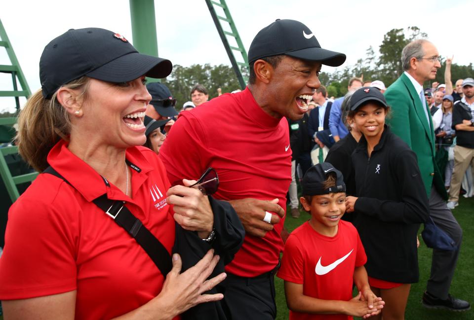 Tiger Woods celebrates his 2019 Masters victory with his children Sam (left) and Charlie (right).