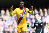 <p>Christian Benteke of Crystal Palace celebrates scoring his sides second goal during the Premier League match between Chelsea and Crystal Palace at Stamford Bridge </p>