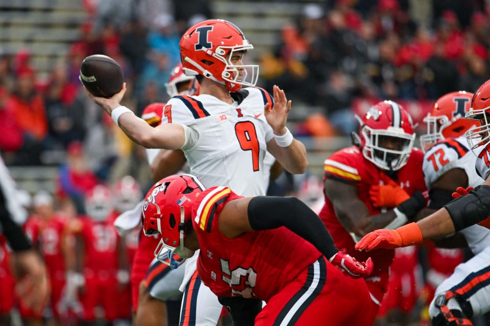 Luke Altmyer passed for 206 yards and two touchdowns despite being sacked five times in Illinois' victory over Maryland.