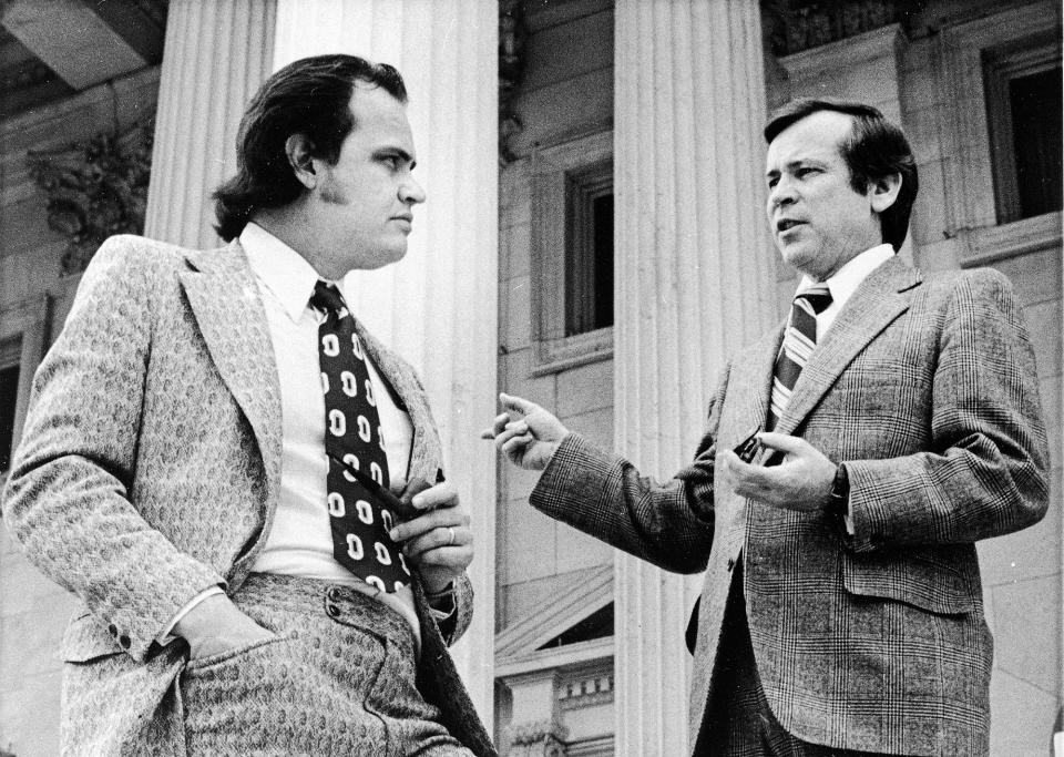 <p>Sen. Howard Baker, right, confers with minority counselor for the Senate Watergate Committee Fred Thompson on the steps of the Capitol, May 16, 1973. (Photo: AP) </p>