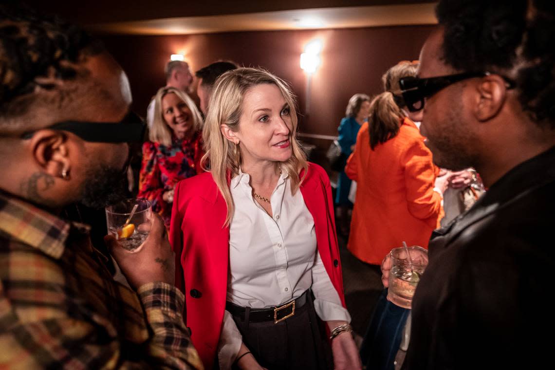 Fort Worth Mayor Mattie Parker speaks to recording artist Leon Bridges at a reception hosted by The Big Good founders on Tuesday, March 7.