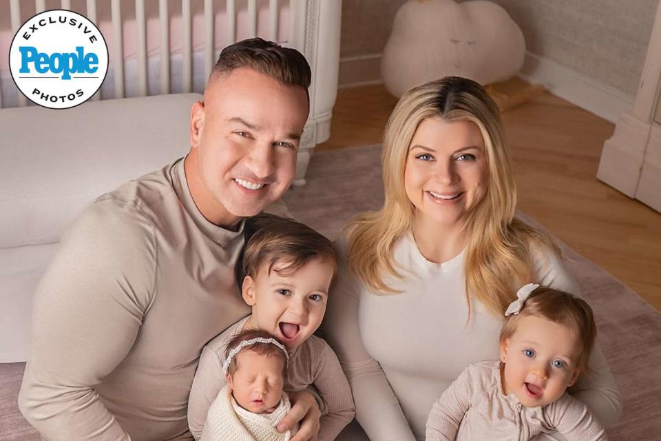 <p>Kristin Baker Photography + Design</p> Mike and Lauren Sorrentino with kids Romeo, Mia and Luna.