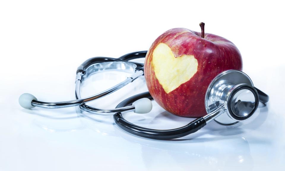 Getty Images/iStockphoto Preventive measures, such as diet and exercise, are an important part of the health care mix. apple with stethoscope