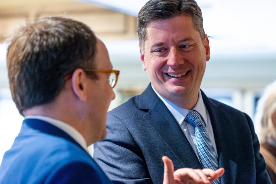 Tulsa Mayor G.T. Bynum, left, speaks with Oklahoma City Mayor David Holt, right, at the Oklahomans United for Progress fundraiser.