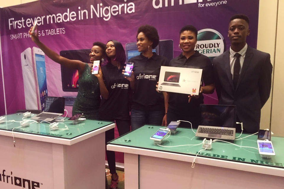 The AfriOne booth at a telecommunications industry conference in Lagos. During the event’s opening session, AfriOne presenters argued for the importance of the company’s Lagos assembly line. “It’s made for us, made in Nigeria, made for Africans, made for the world,” one of them exclaimed, as puffs of smoke revealed a three-foot mock-up of the company’s Champion smartphone. “It’s the first of its kind in Africa. Imagine that! No more importation.” (Photo: Armin Rosen for Yahoo News)