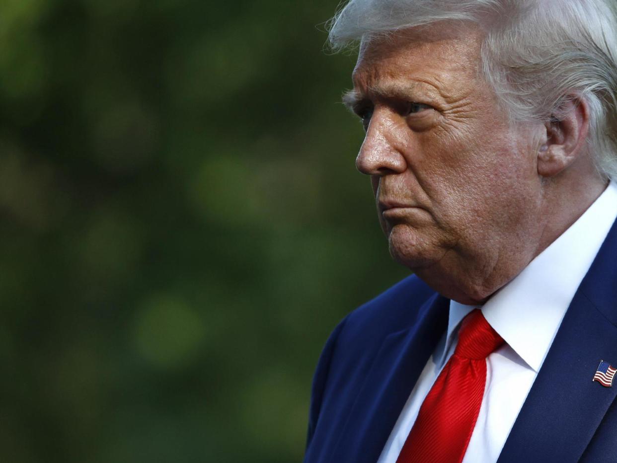 Donald Trump walks on the South Lawn of the White House in Washington after stepping off Marine One: AP/Patrick Semansky