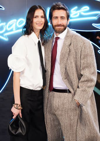 <p>Ian West/PA Images via Getty Images</p> Jeanne Cadieu and Jake Gyllenhaal in London on March 14, 2024