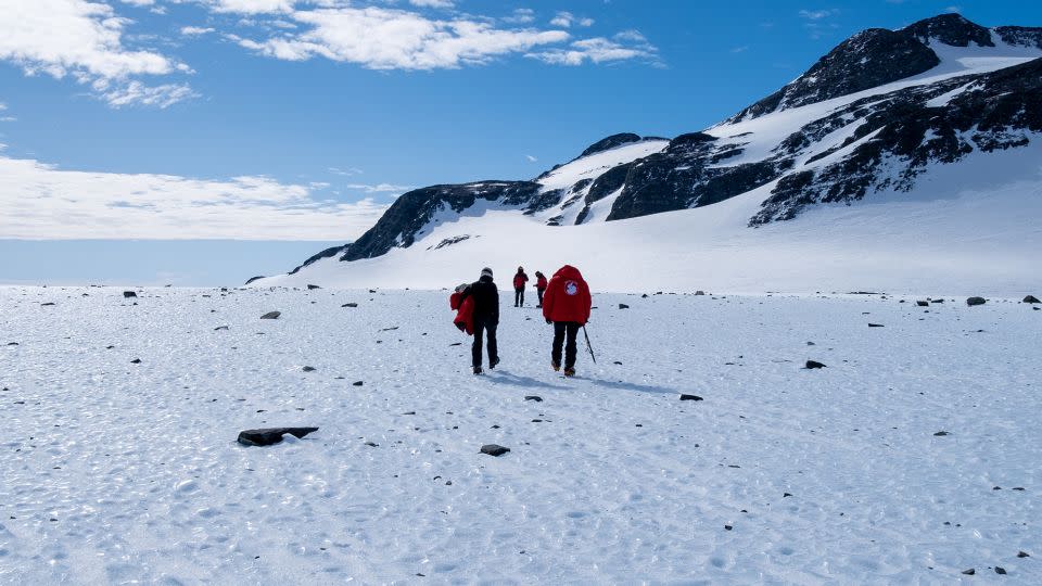 Meteorites are disappearing into Antarctic ice, a new study says, due to the climate crisis.  Ice sampling takes place on a blue ice area during the Chilean Antarctic Institute field mission in 2022. - José Jorquera (Antarctica.cl)/University of Santiago;  Chili