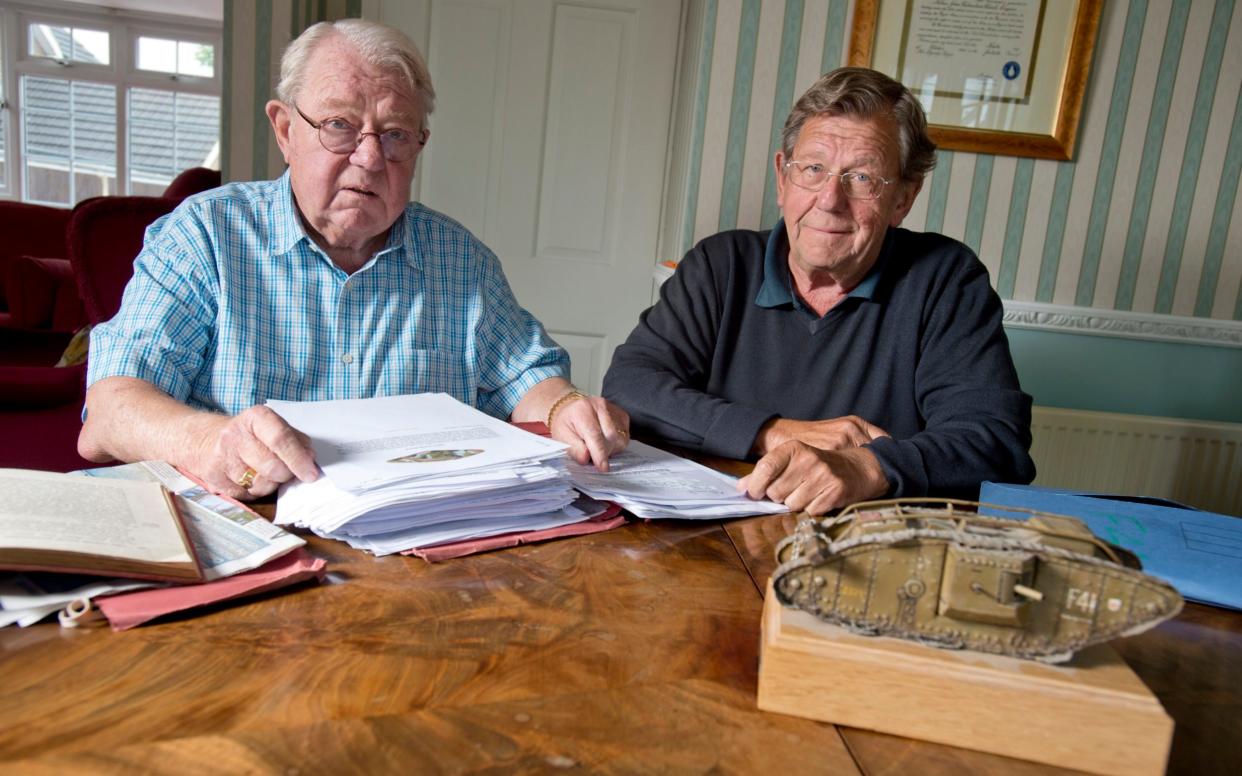 John and Richard Black with a model of the tank in which their grandfather was besieged for 72 hours - David Rose