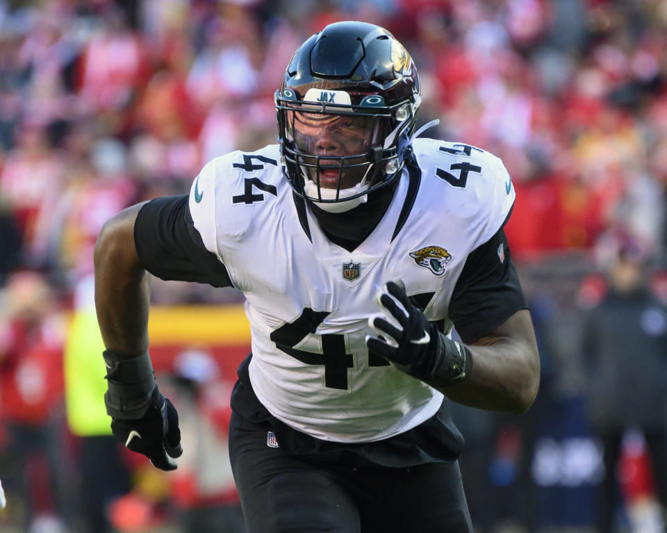 FILE - Jacksonville Jaguars linebacker Travon Walker rushes against the Kansas City Chiefs during the second half of an NFL football game, Sunday, Nov. 13, 2022 in Kansas City, Mo. Travon Walker and Aidan Hutchinson will forever be compared to one another. The top two picks in the 2022 NFL draft will be on the same field for the first time as pros when Detroit hosts Jacksonville on Sunday, a matchup of 4-7 teams that won a combined five games in November and are clinging to slim playoff hopes. (AP Photo/Reed Hoffmann, File)