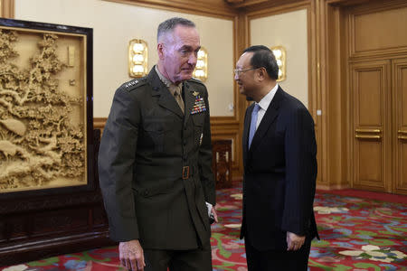 Chinese State Councillor Yang Jiechi meets General Joseph Dunford, chairman of the US Joint Chiefs of Staff at the Zhongnanhai Leadership Compound in Beijing on August 17, 2017. REUTERS/Wang/Zhao/Pool