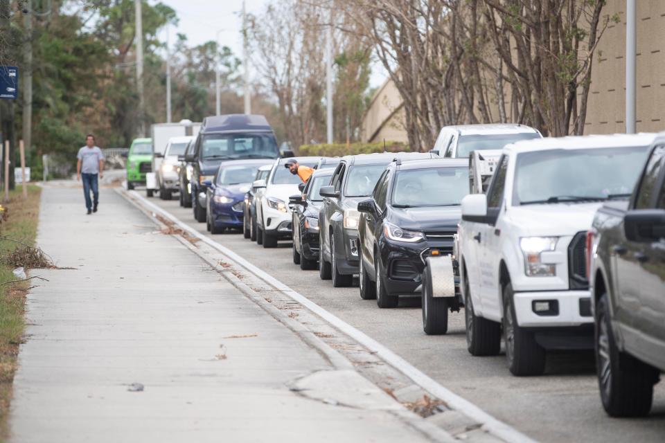 The turnoff to San Carlos Blvd. from Summerlin Rd. is backed up with drivers headed to Fort Myers Beach on Sunday, October 9, 2022. 