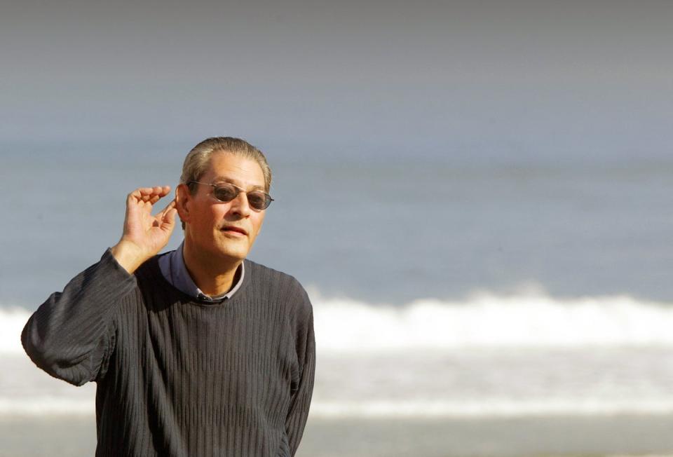 Paul Auster, the author of ‘The New York Trilogy’ and ‘Moon Palace’, has died aged 77 (AFP via Getty Images)