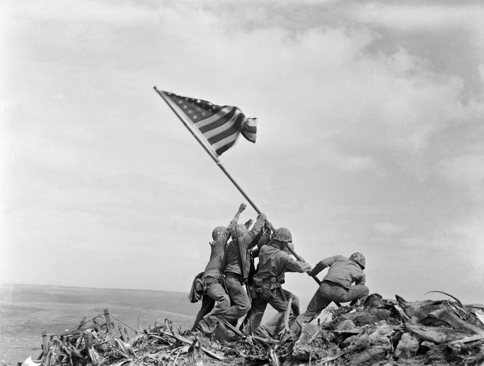 US Marines of the 28th Regiment, 5th Division, raise the Stars and Stripes on Mount Suribachi, Iwo Jima, Japan, on February 23, 1945, in what became one of the most iconic images of the Second World War (Copyright 2017 The Associated Press. All rights reserved.)
