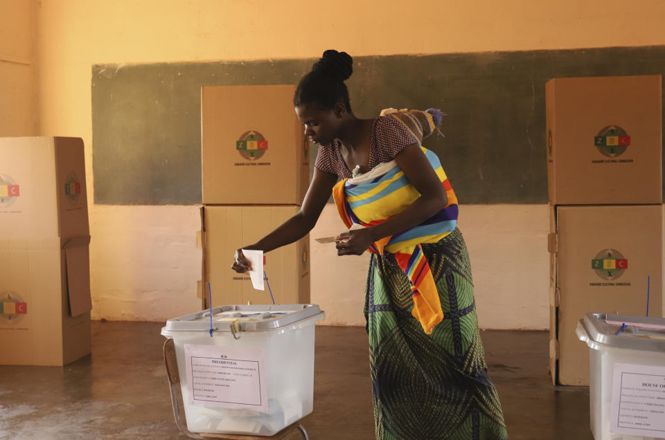 A woman casts her vote at a polling station in Kwekwe, Zimbabwe, Wednesday, Aug. 23, 2023. Polls have opened in Zimbabwe as President Emmerson Mnangagwa seeks a second and final term in a country with a history of violent and disputed votes. (AP Photo)