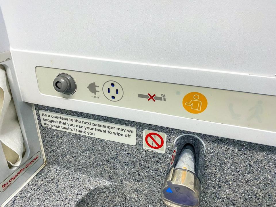 Airplane lavatory power outlet