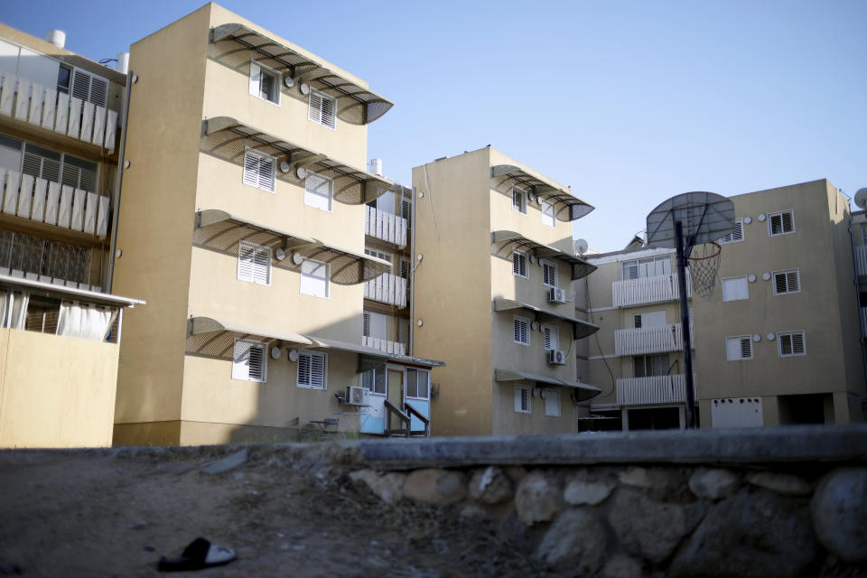 Apartment buildings have added bomb shelters, in Sderot, Israel, July 28, 2021. No place in Israel has been hit harder by Palestinian rocket fire than Sderot, a working-class town just about a mile (1.5 kilometers) from the Gaza border. Although Sderot is enjoying an economic boom and revival, a generation of children and parents are suffering from the traumatic effects of two decades of rocket fire that experts are still struggling to understand.