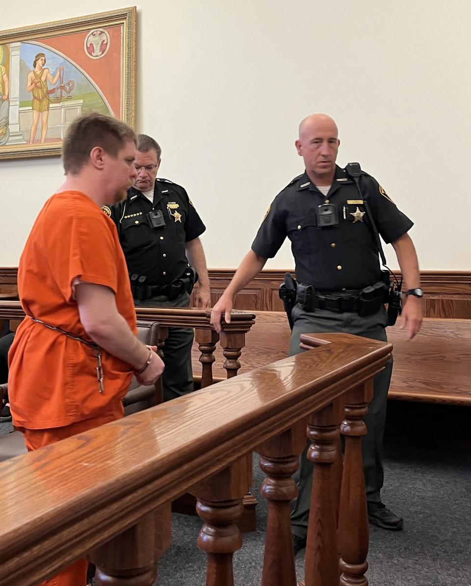 Jason M. Gordon is escorted out of Tuscarawas County Common Pleas Court after being sentenced to 55 years to life in prison on six sexually related charges.