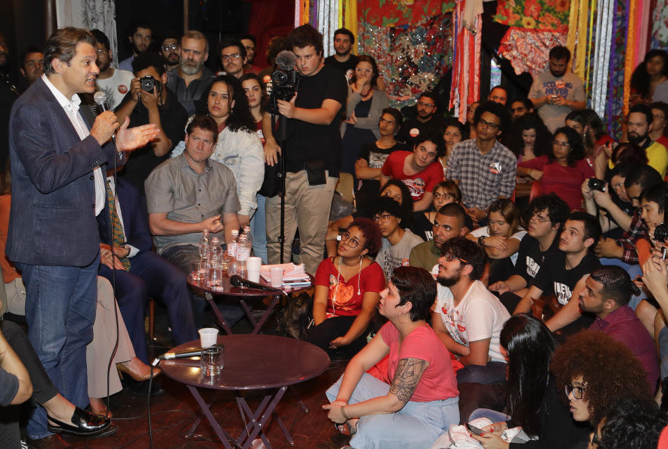 Brazil's presidential candidate for the Workers Party Fernando Haddad speaks during a meeting with students, in Sao Paulo, Brazil, Wednesday, Sept. 12, 2018. Haddad met with university students who benefited from an affirmative action program for underprivileged youth and racial minorities, put in place during the presidency of Luiz Inacio Lula da Silva. Brazil will hold general elections on Oct. 7. (AP Photo/Andre Penner)