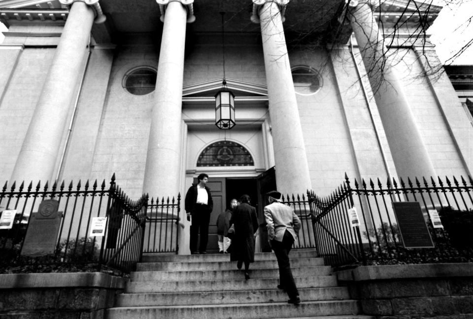 11/23/95 - photographer: Juana Arias TWP. Holy Trinity 36th & Ns t NW Parishioners going inside church to attend mass at the Holy Trinity Catholic Church in Georgetown .  (Photo by Juana Arias/The Washington Post/Getty Images)
