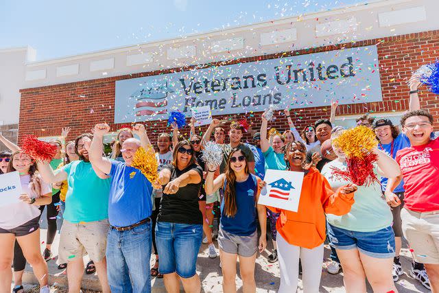 <p>Veteran's United Home Loans</p> Veterans United team members show their company spirit.