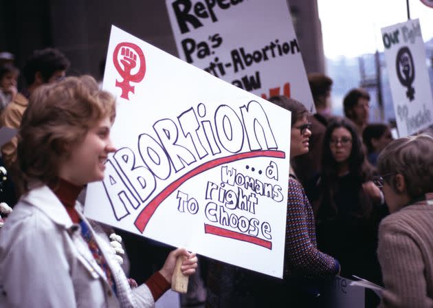 Woman holds sign at reproductive rights demonstration, Pittsburgh, PA, 1974. (Photo: Barbara Freeman via Getty Images)