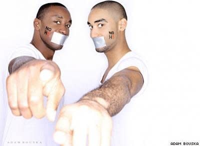 Former NBA star, Isiah Thomas, poses with his son for NOH8, a campaign that advocates gay marriage and LGBT rights.   Other pro athletes who've participated: football players <a href="http://outsports.com/jocktalkblog/2011/05/11/carolina-panthers-linebacker-nic-harris-does-portrait-for-the-noh8-campaign/">Nic Harris, Antonio Cromartie and Isaac Keys</a>, all-American wrestler <a href="http://www.noh8campaign.com/photo-gallery/familiar-faces-part-2/photo/12954">Hudson Taylor</a>, and soccer player <a href="http://www.noh8campaign.com/photo-gallery/familiar-faces-part-2/photo/15572">Mike Chabala</a>. 
