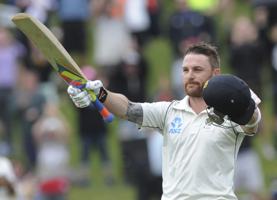 New Zealand’s Brendon McCullum celebrates his triple century against India on the final day of the second test at the Basin Reserve in Wellington, New Zealand, Tuesday, Feb. 18, 2014. (AP Photo/SNPA, Ross Setford) NEW ZEALAND OUT