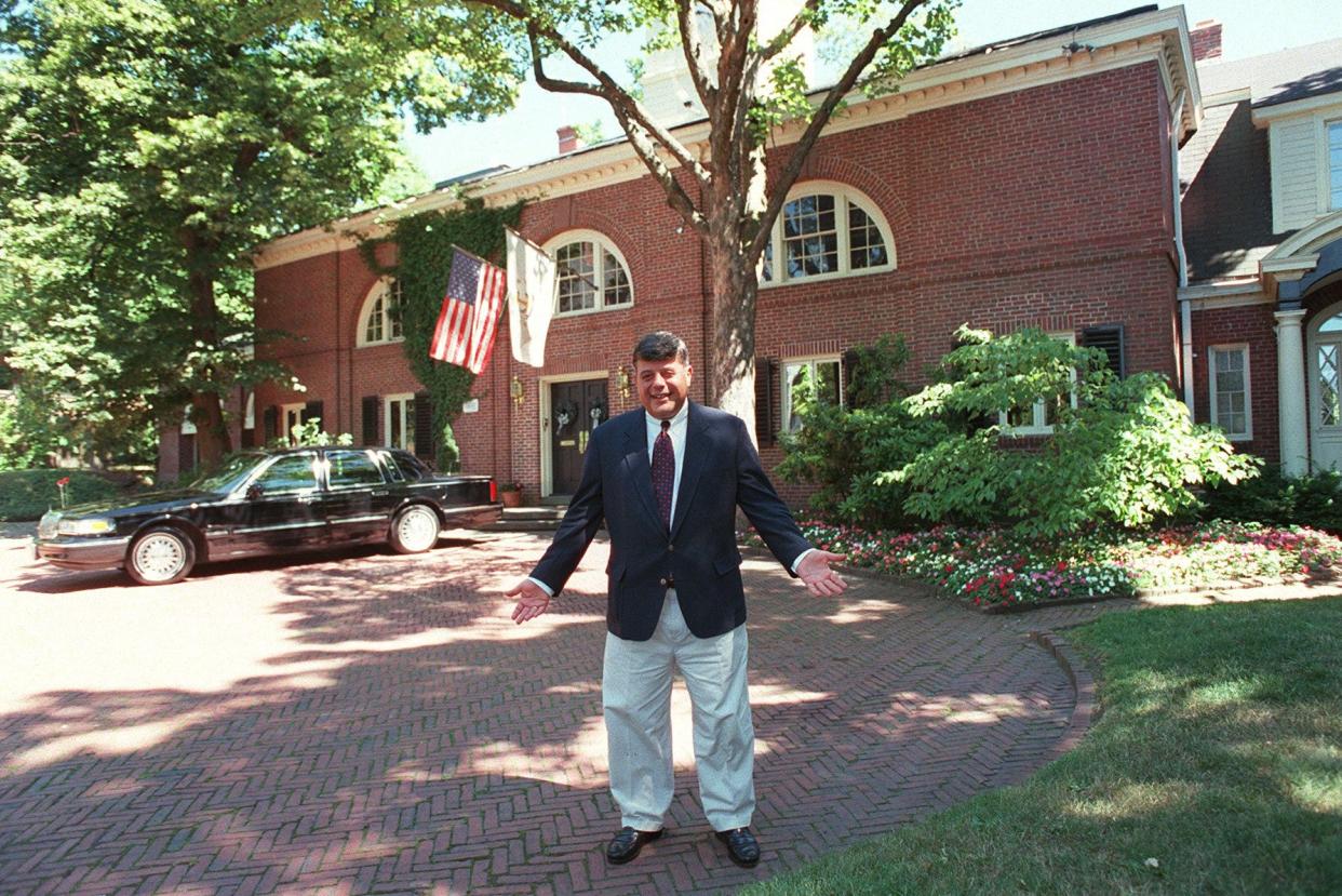 A Providence Journal file photo showing Mayor Vincent A. Cianci Jr.'s East Side home, with its flags flying over the entrance.