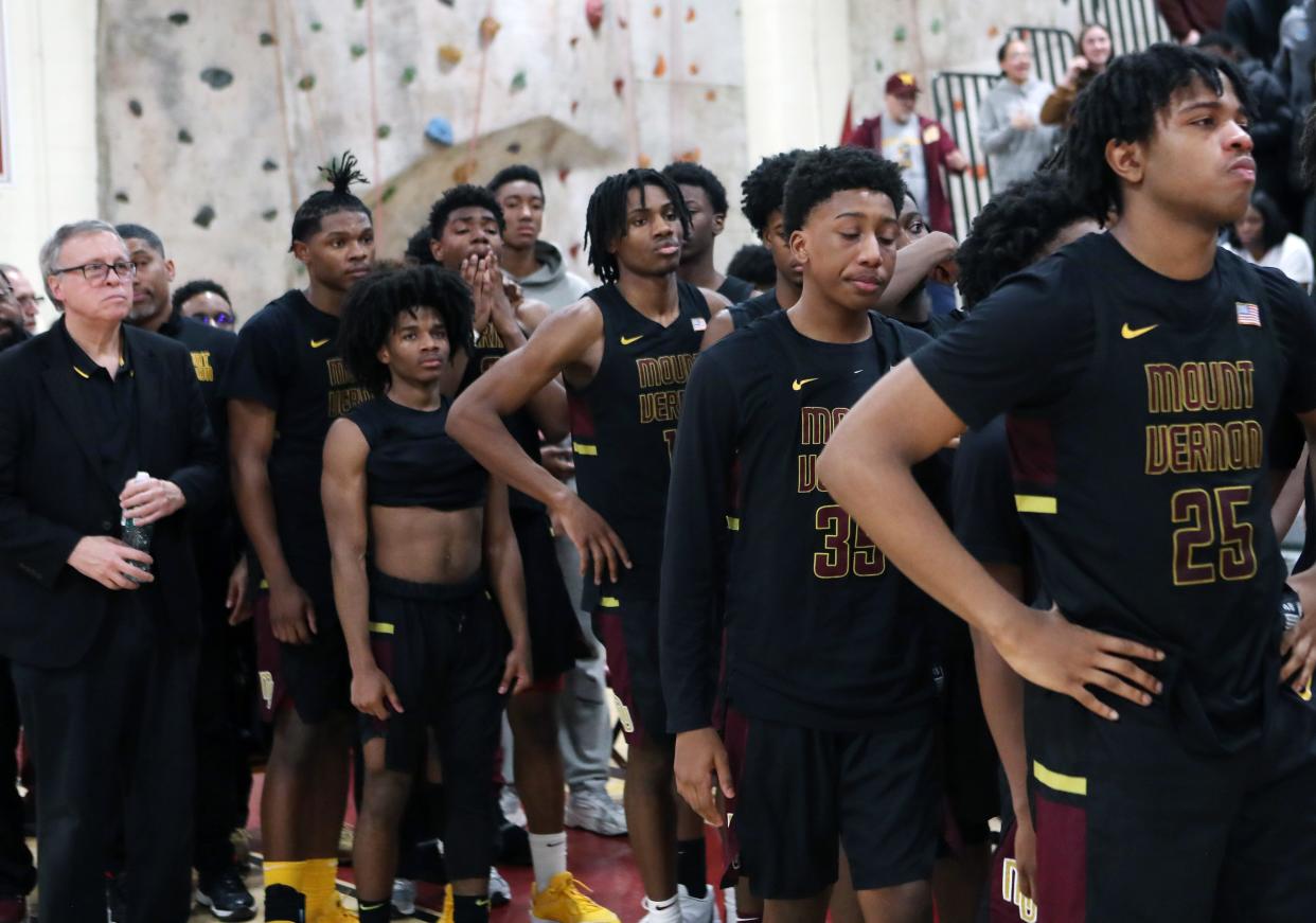 Mt. Vernon players watch their playoff run come to end after falling to Kingston 81-78 in the state regional final at Kingston High School March 8, 2024.