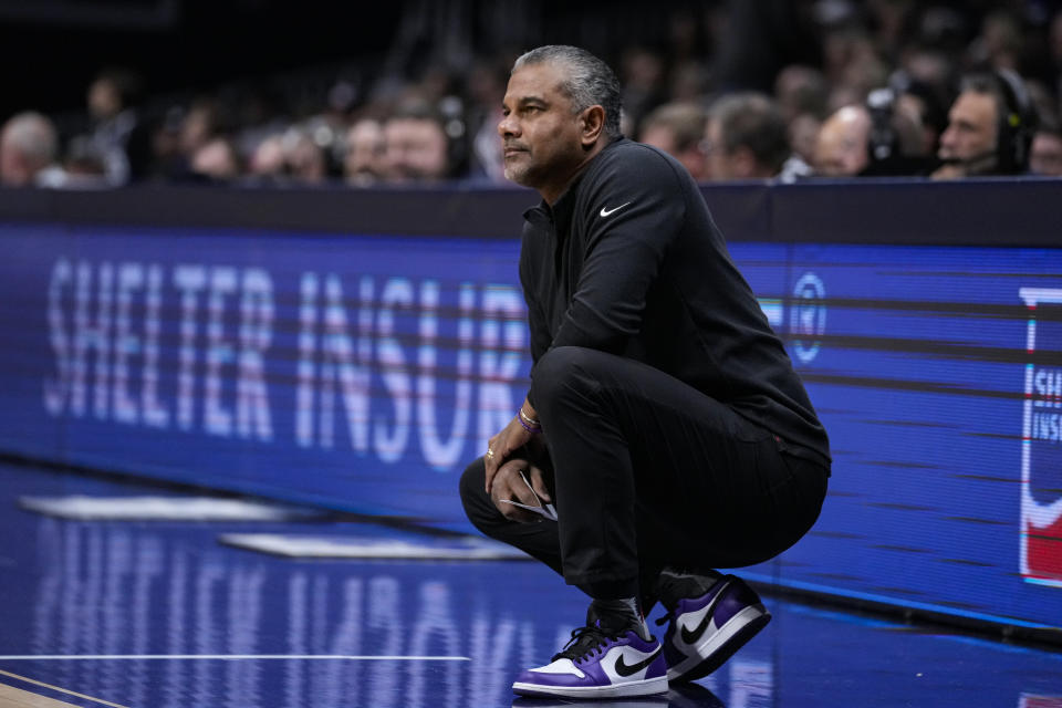 Kansas State head coach Jerome Tang watches his team play against Butler in the first half of an NCAA college basketball game in Indianapolis, Wednesday, Nov. 30, 2022. (AP Photo/Michael Conroy)