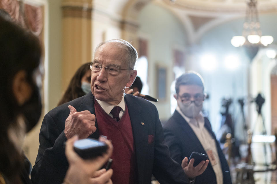 Sen. Chuck Grassley, R-Iowa, speaks to reporters as they walk on Capitol Hill in Washington, Tuesday, Dec. 7, 2021.(AP Photo/Carolyn Kaster)