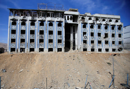 A view shows the damaged Agriculture Ministry building at the city of Douma in Damascus, Syria April 16, 2018. REUTERS/Ali Hashisho