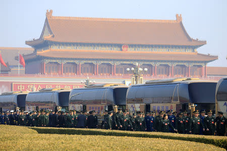 Military delegates arrive at the Great Hall of the People for a meeting ahead of National People's Congress (NPC), China's annual session of parliament, in Beijing, China March 4, 2019. REUTERS/Aly Song