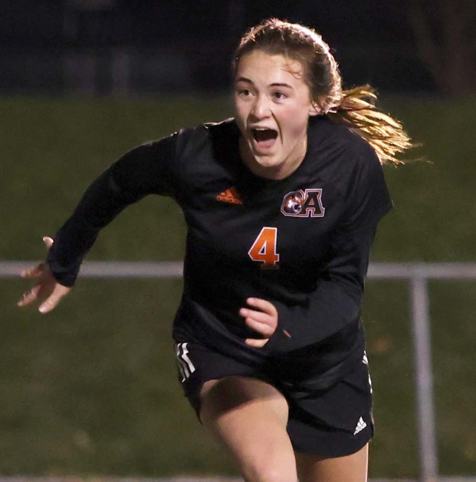 Oliver Ames' Emma Gavin celebrates her winning goal in double-overtime during a Div. 2 state semifinal vs. Grafton at Mansfield High School on Tuesday, Nov. 15, 2022.