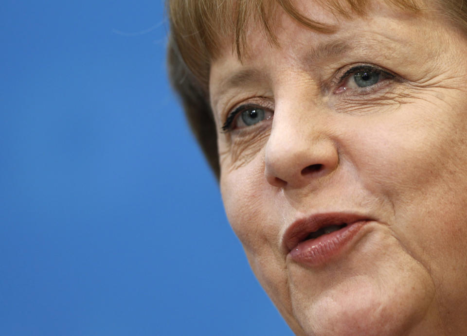 German Chancellor and chairwoman of the German Christian Democrats, CDU, Angela Merkel, speaks during a press conference after the party's weekly executive committee meeting in Berlin, Germany, Monday, March 26, 2012. (AP Photo/Michael Sohn)