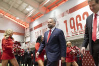 New Nebraska NCAA college football coach Matt Rhule, left, arrives with athletic director Trev Alberts for an introductory press conference, Monday, Nov. 28, 2022, in Lincoln, Neb. (AP Photo/Rebecca S. Gratz)