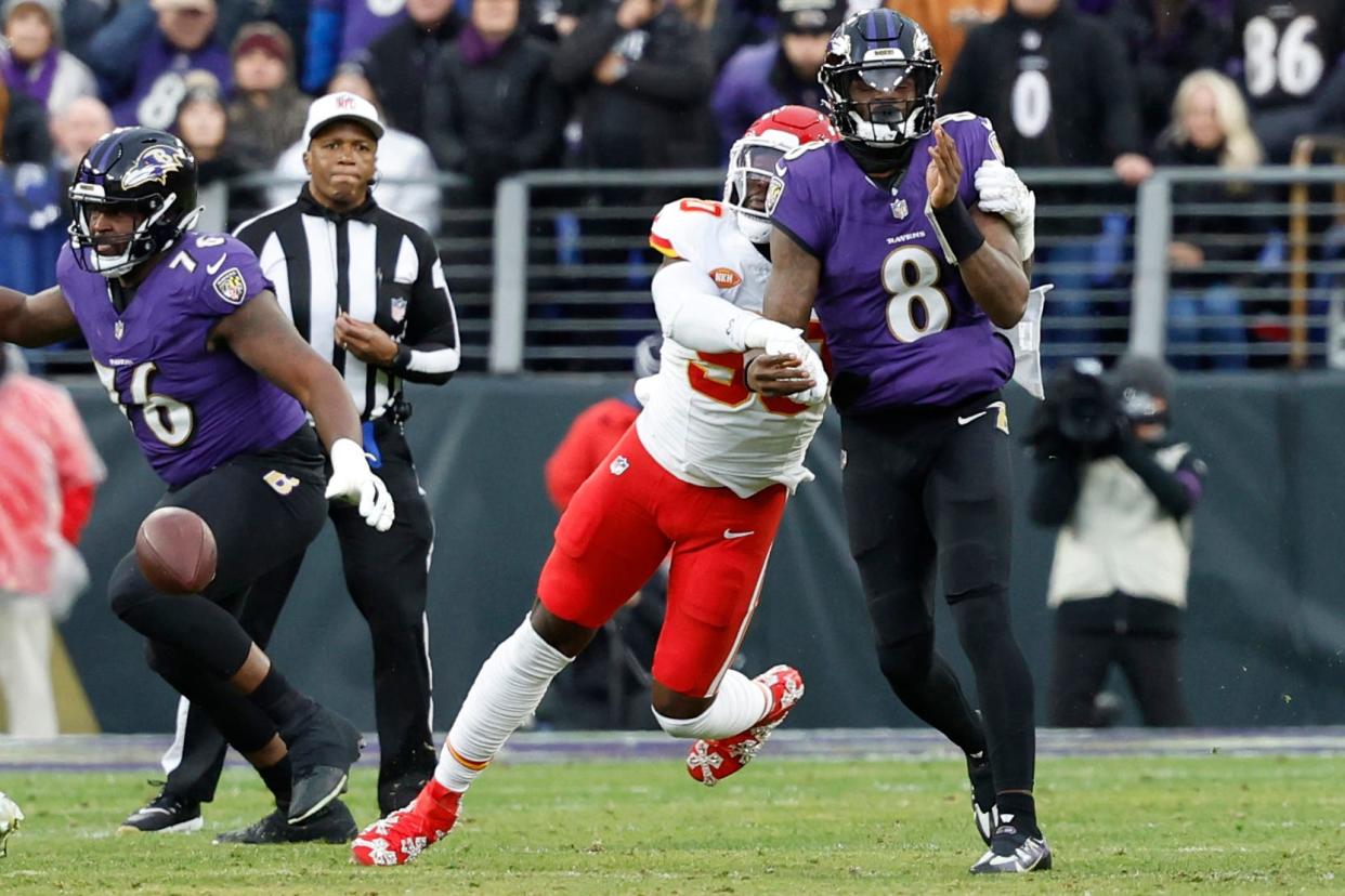 Kansas City Chiefs defensive end Charles Omenihu strips the ball away from Baltimore Ravens quarterback Lamar Jackson in a pivotal play of last season's AFC championship game in Baltimore. It helped the Chiefs get to the Super Bowl.