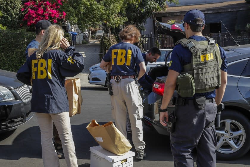 FBI agents remove items from L.A. City Councilman Jose Huizar's residence in Boyle Heights.