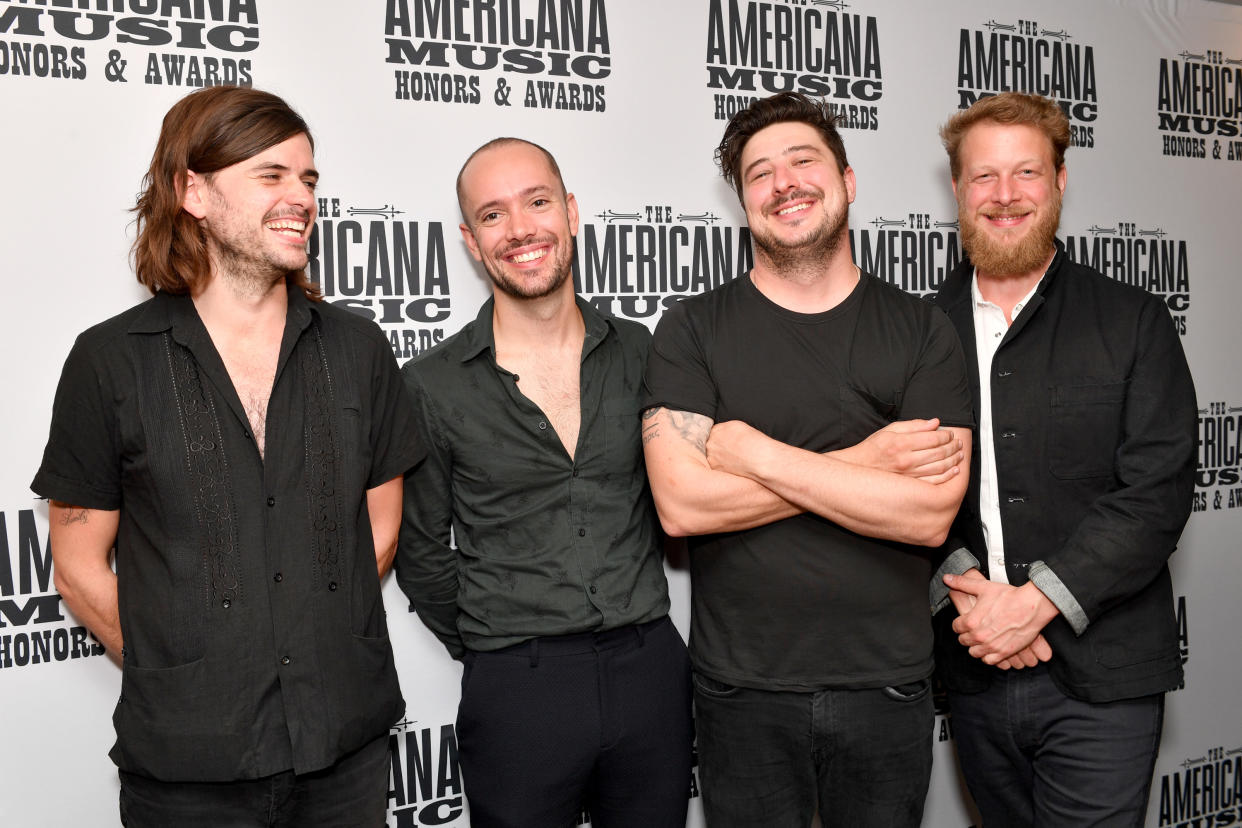 Winston Marshall (L) has left Mumford and Sons while Ben Lovett, Marcus Mumford and Ted Dwane remain in the group. (Photo by Erika Goldring/Getty Images for Americana Music Association)