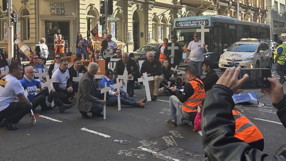 Around 100 union members have convened at a vigil in Sydney's CBD. Picture: Supplied.