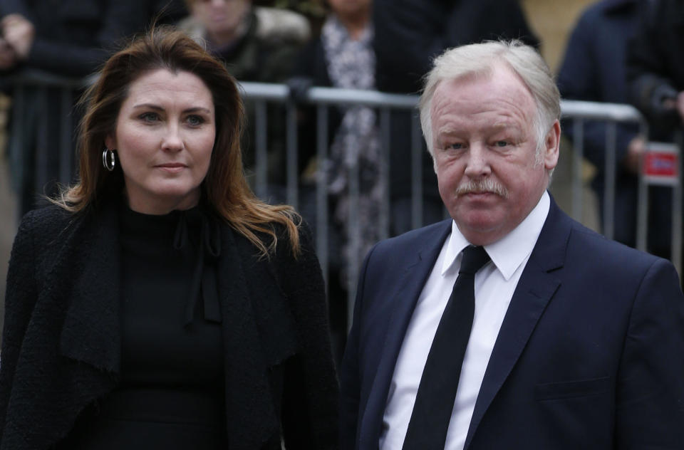Les Dennis and his wife Claire Nicholson arrive at Manchester Cathedral for the funeral of Coronation Street creator and writer Tony Warren.