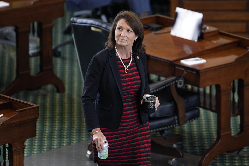 Texas state Sen. Angela Paxton, R-McKinney, wife of suspended Texas state Attorney General Ken Paxton, walks through the Senate Chamber during the impeachment trial for her husband at the Texas Capitol, Saturday, Sept. 16, 2023, in Austin, Texas. (AP Photo/Eric Gay)