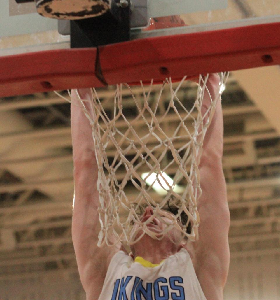 River Valley's Carson Myers dunks the ball during a boys basketball Division II district semifinal game against Granville at Worthington Christian.