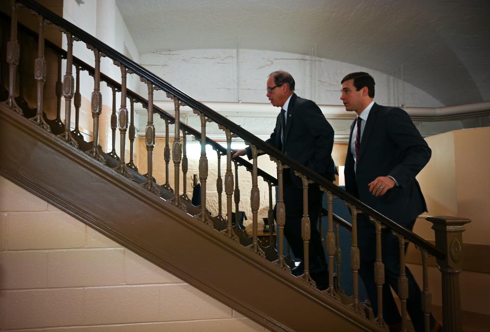 Senator Mike Braun, R-Indiana, quickly walking up the stairs with Chief of Staff Josh Kelley from the basement of the Russell Senate Office Building heading to an Indiana Republican Delegation event at the Capitol Hill Club.