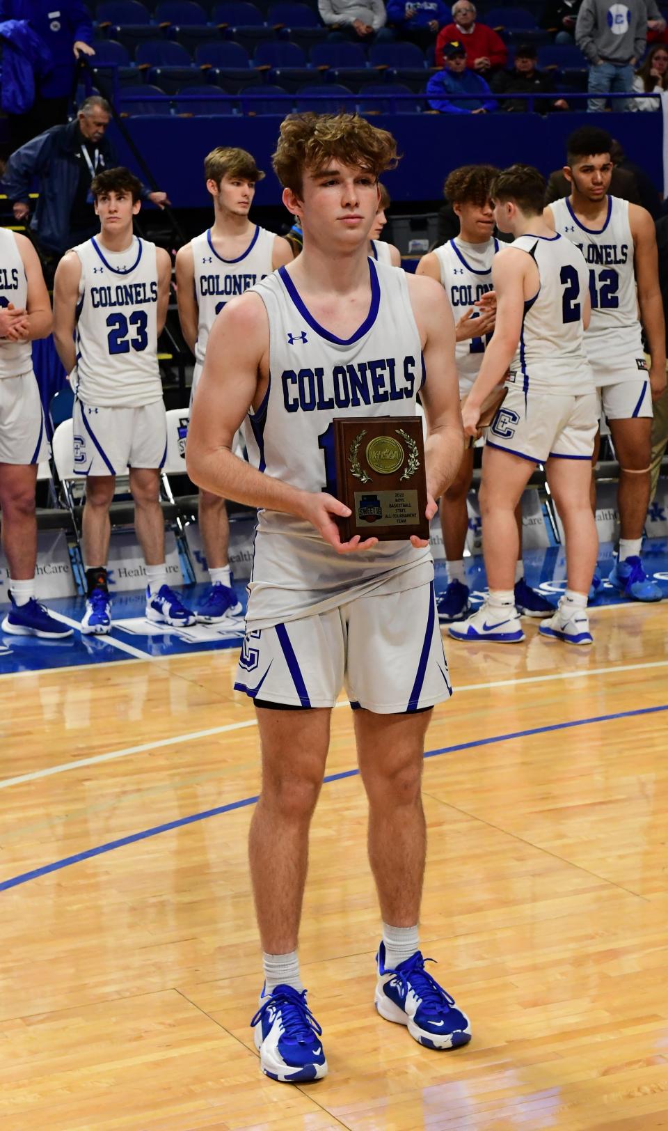 Brady Hussey sports his award for making the KHSAA state basketball all-tournament team in the boys basketball 2022 KHSAA state final four semifinal at Rupp Arena, March 19, 2022