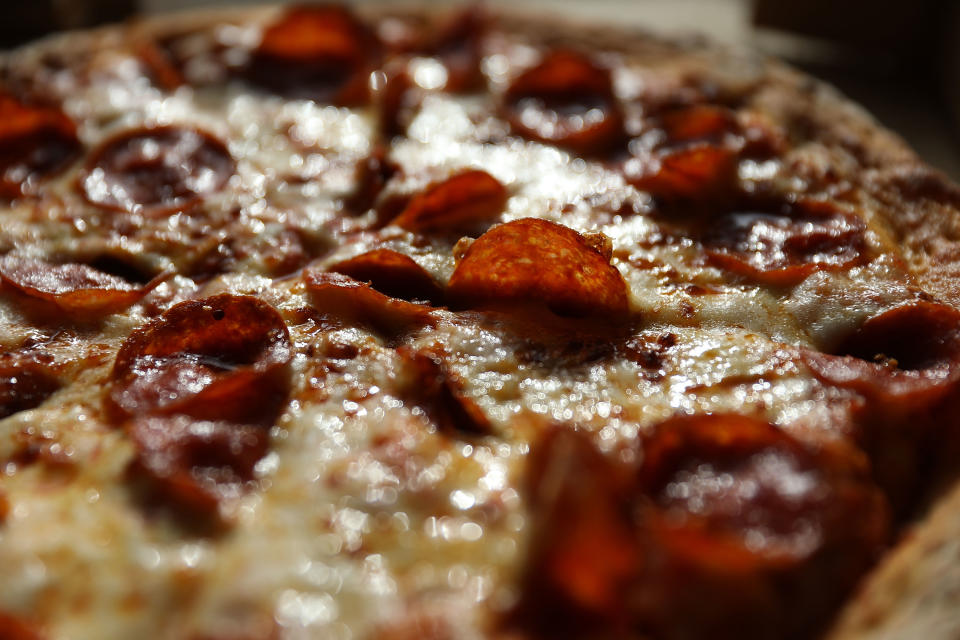 MIAMI, FL - JULY 11:  In this photo illustration, a Papa John's pizza is seen on July 11, 2018 in Miami, Florida. The founder of Papa John's pizza, John Schnatter, apologized Wednesday for using the N-word on a conference call in May.  (Photo illustration by Joe Raedle/Getty Images)