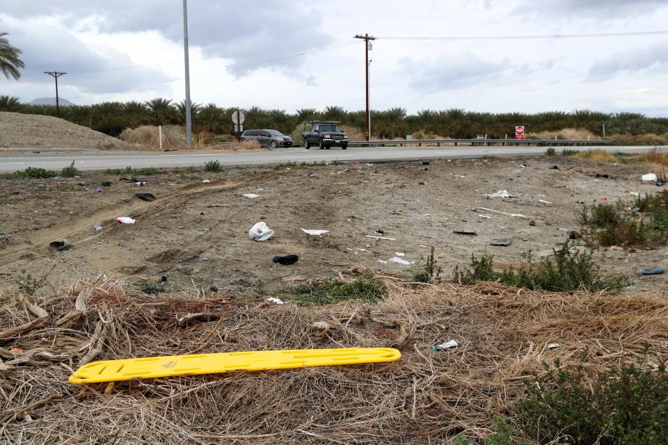 Five people including two children died in a car crash at the intersection of 81st Avenue and State Route 86 in Oasis, Calif., on Saturday, Jan. 14, 2023. A yellow ribbon, stretcher and other debris can be seen at the crash site on Sunday, Jan. 15, 2023. 