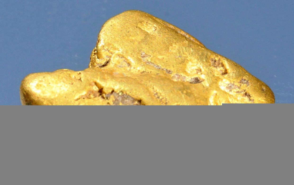 How a gold nugget ended up in the Shropshire Hills, where the landscape was once under a prehistoric ocean, remains a mystery.